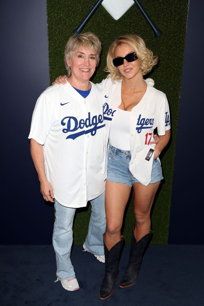Christy Martin and Sydney Sweeney pose for a photo prior to Game Four of the 2025 World Series presented by Capital One between the Toronto Blue Jays and the Los Angeles Dodgers at Dodger Stadium on Tuesday, October 28, 2025 in Los Angeles, California. (Photo by Joe Scarnici/MLB Photos via Getty Images)