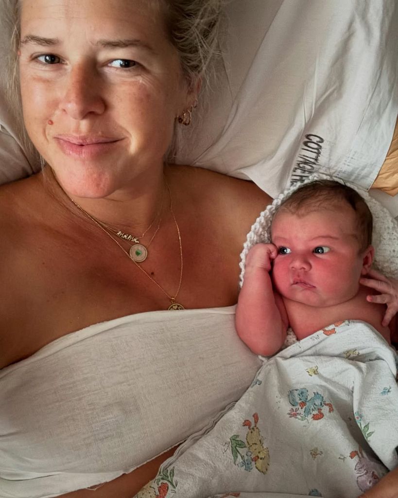 Sarah Wright Olsen holds her newborn baby girl, Ocean Rain Olsen, in a photo shared on Instagram