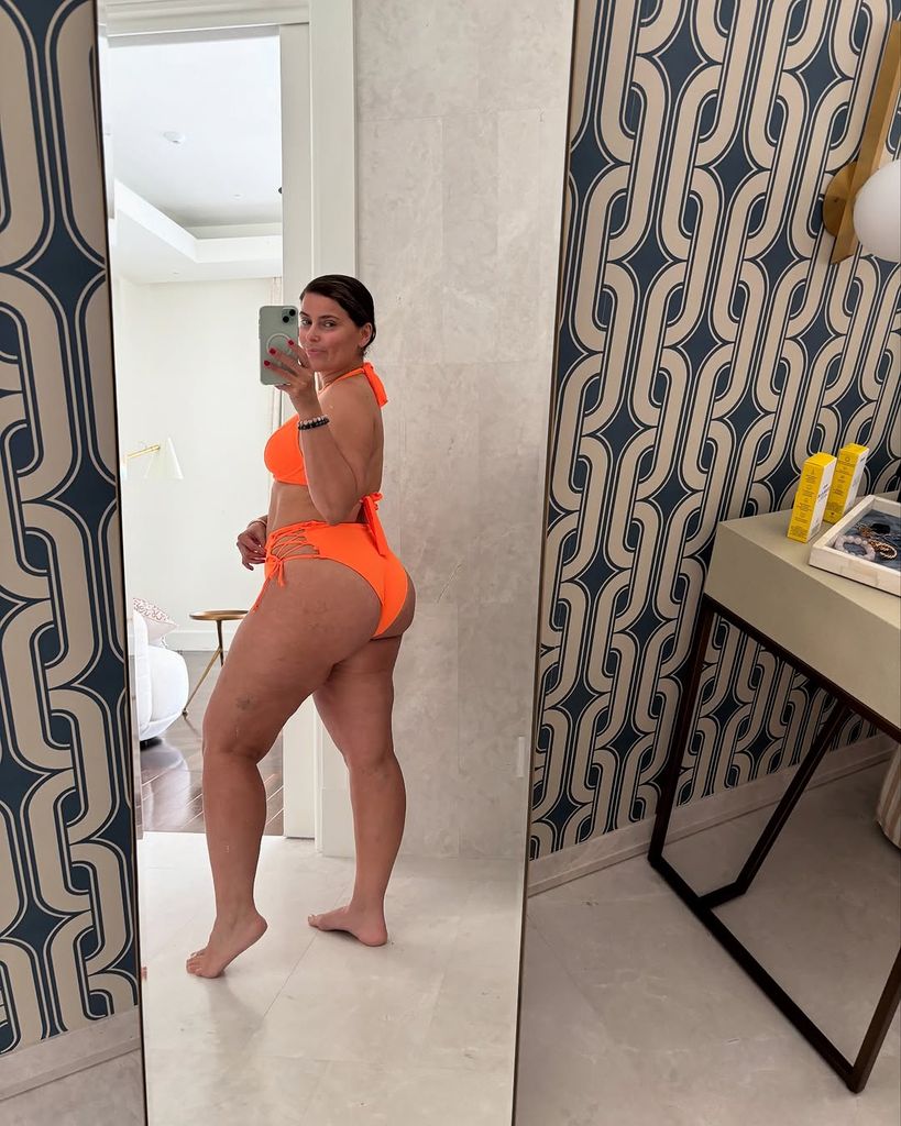 Nelly rocks and orange bikini