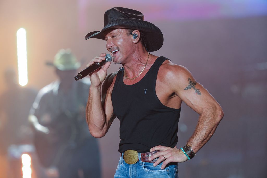Tim McGraw stage cowboy hat vest