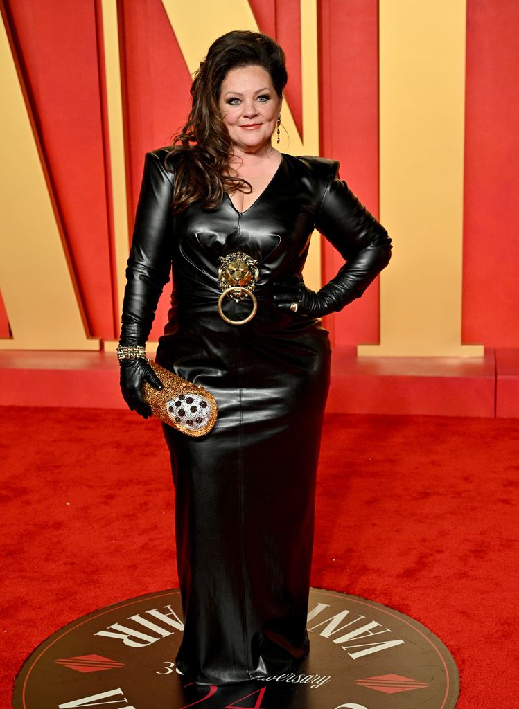 Melissa in a black leather dress 