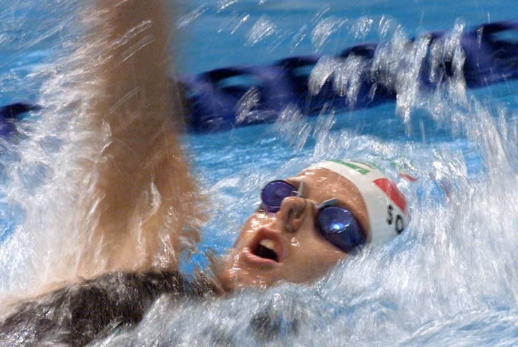 Charlene Wittstock of South Africa powers through her women's 200m backstroke heat  at Sydney 2000 Olympics