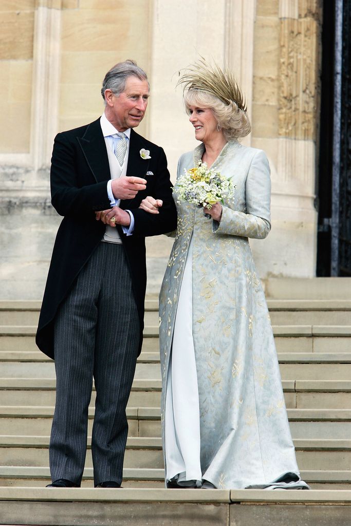 King Charles and Queen Consort Camilla leave the Service of Prayer and Dedication blessing their marriage at Windsor Castle on April 9, 2005