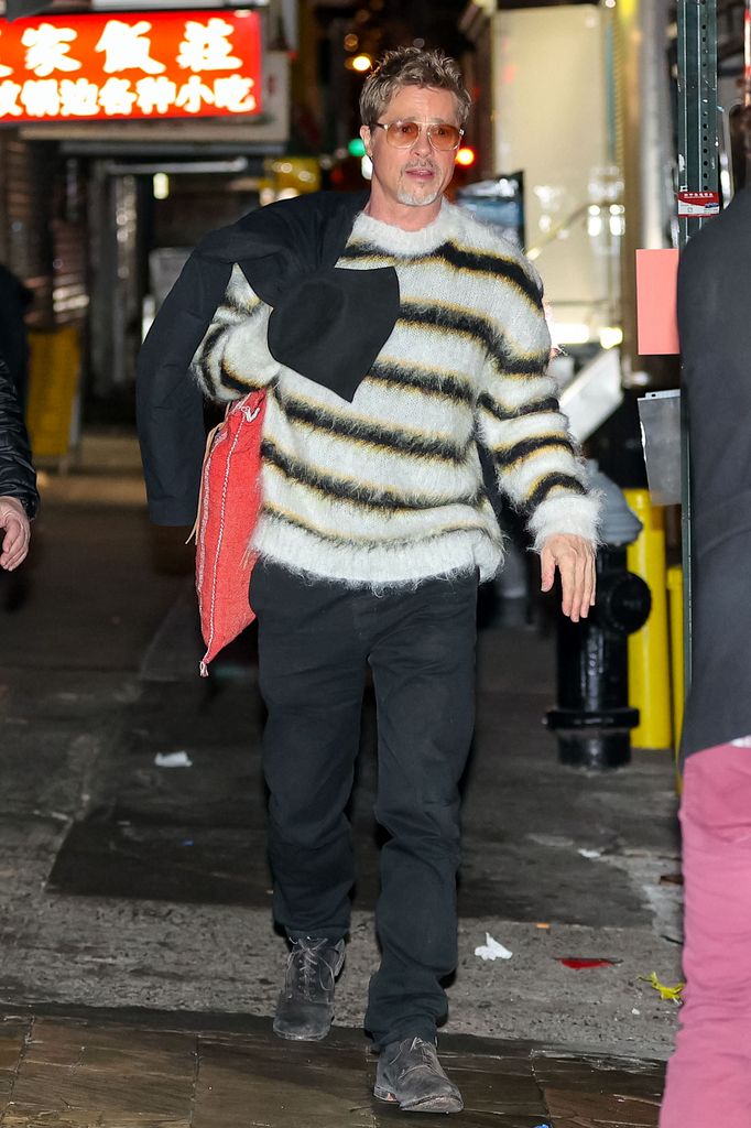  Brad Pitt is seen on movie set of the 'Wolves' in striped knit