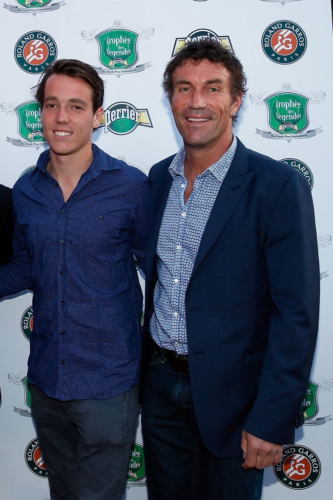 Jett Cash posing with father Pat Cash