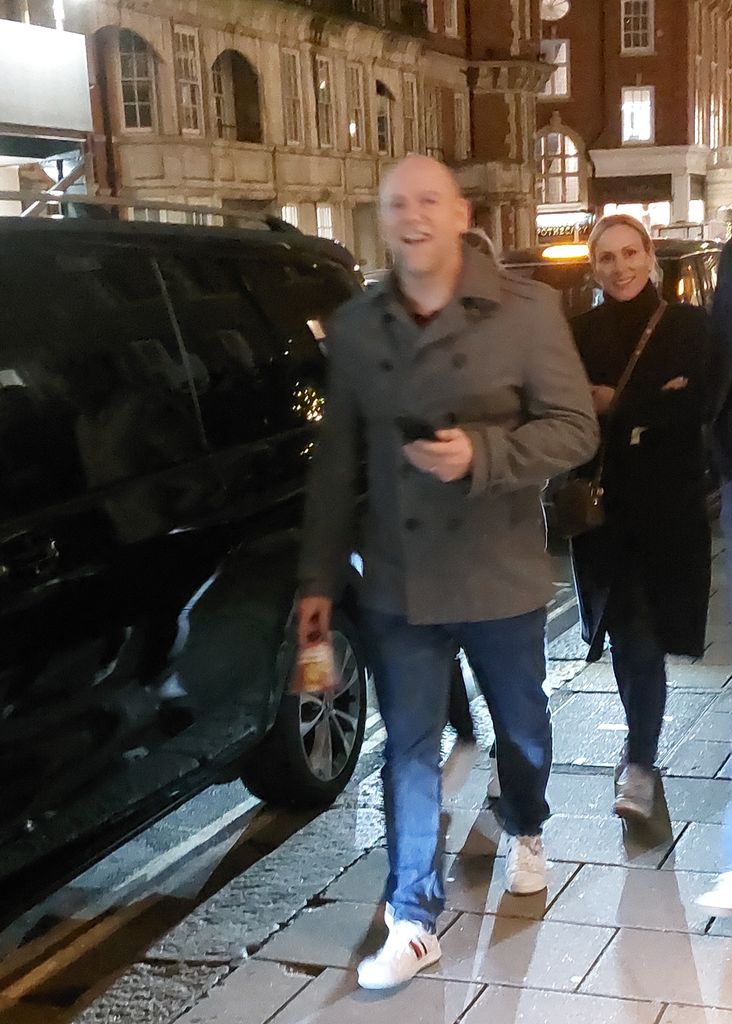 couple walking through streets of London 