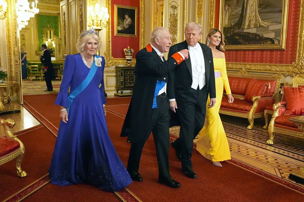 Britain's Queen Camilla, Britain's King Charles III, US President Donald Trump and US First Lady Melania Trump arrive to attend a State Banquet at Windsor Castle, in Windsor, on September 17, 2025, during the US President's second State Visit. US President Donald Trump arrived in Britain for an unprecedented second State Visit, with the UK government rolling out a royal red carpet welcome to win over the mercurial leader