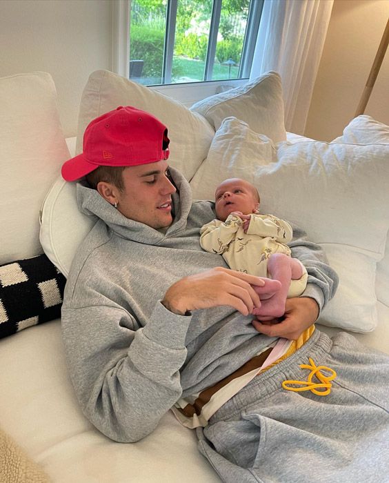 Justin Bieber cradles tiny newborn - and fans think he's now a dad
