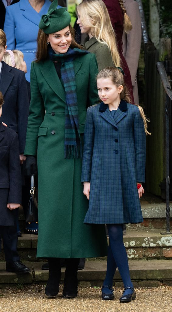 princesses kate and charlotte in coats outside