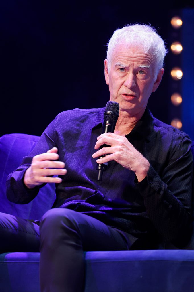 John McEnroe on stage during Andy Murray's "Centre Stage" theatre tour.
