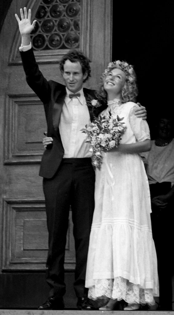 John McEnroe waves at his wedding with Tatum O'Neal 