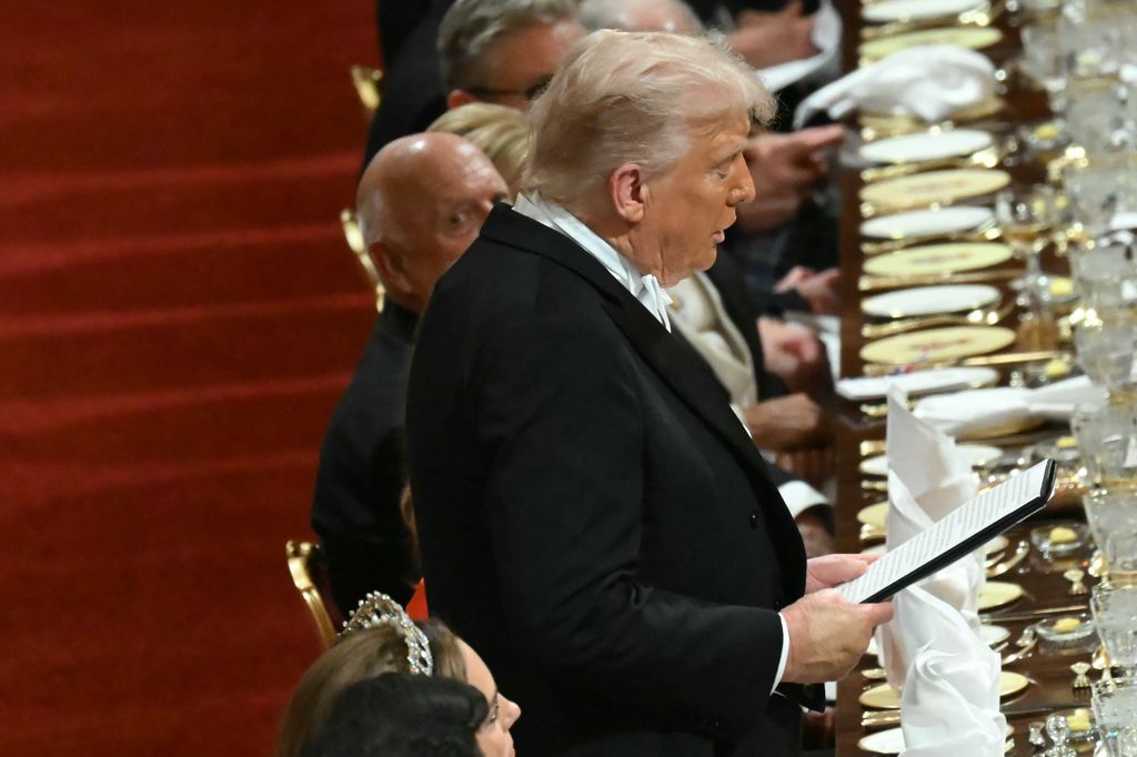 US President Donald Trump delivers a speech at a State Banquet 