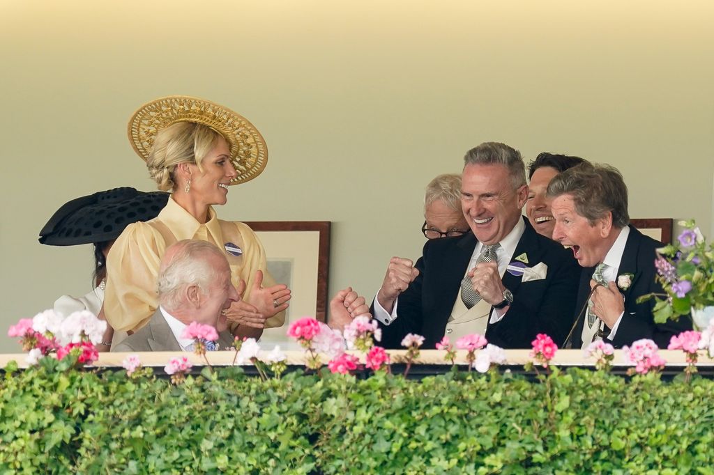 Zara Tindall and King Charles smile 