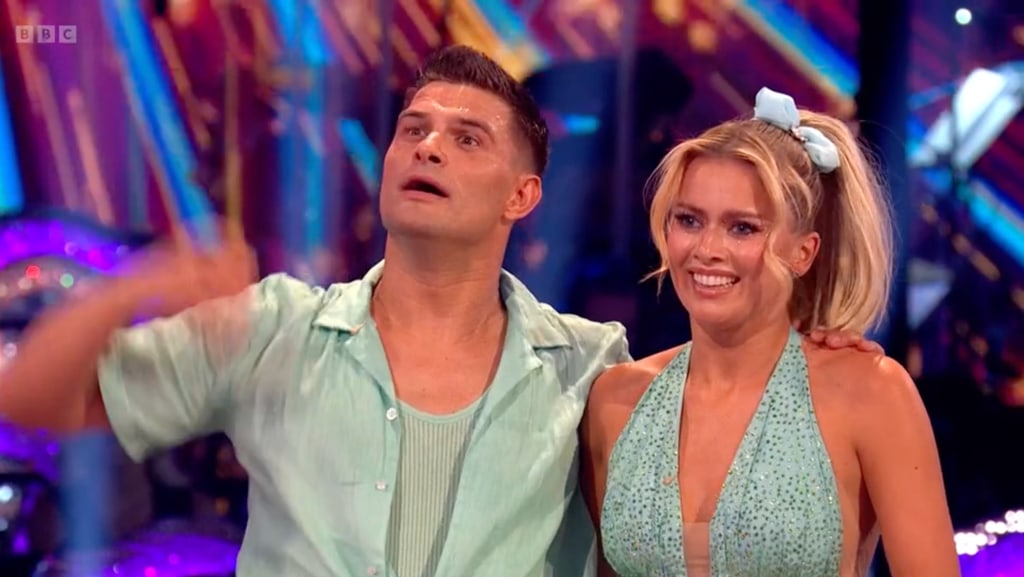 Tasha Ghouri and Aljaz Skorjanec listening to the judges