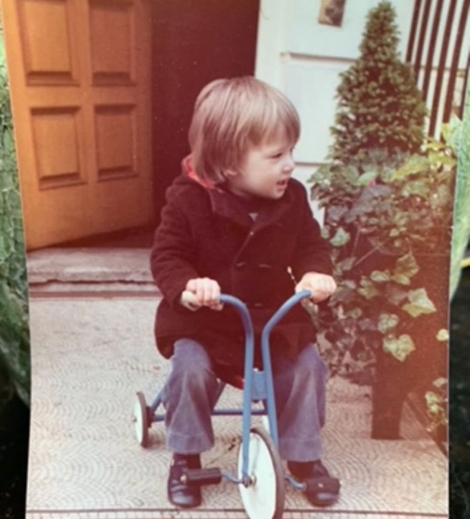 Ben Fogle cycling his bike as a child