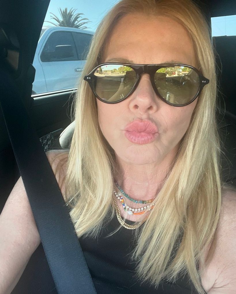 Sheryl Berkoff takes a selfie in her car, shared by her husband Rob Lowe on Instagram