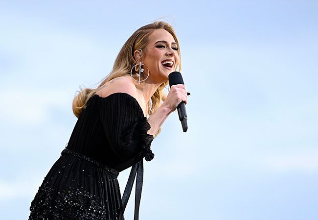 Adele smiling whilst performs on stage as American Express present BST Hyde Park in Hyde Park 