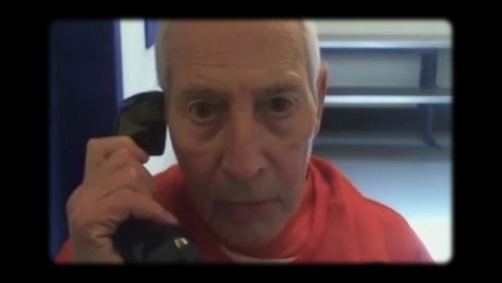Bob Durst taking a call in prison