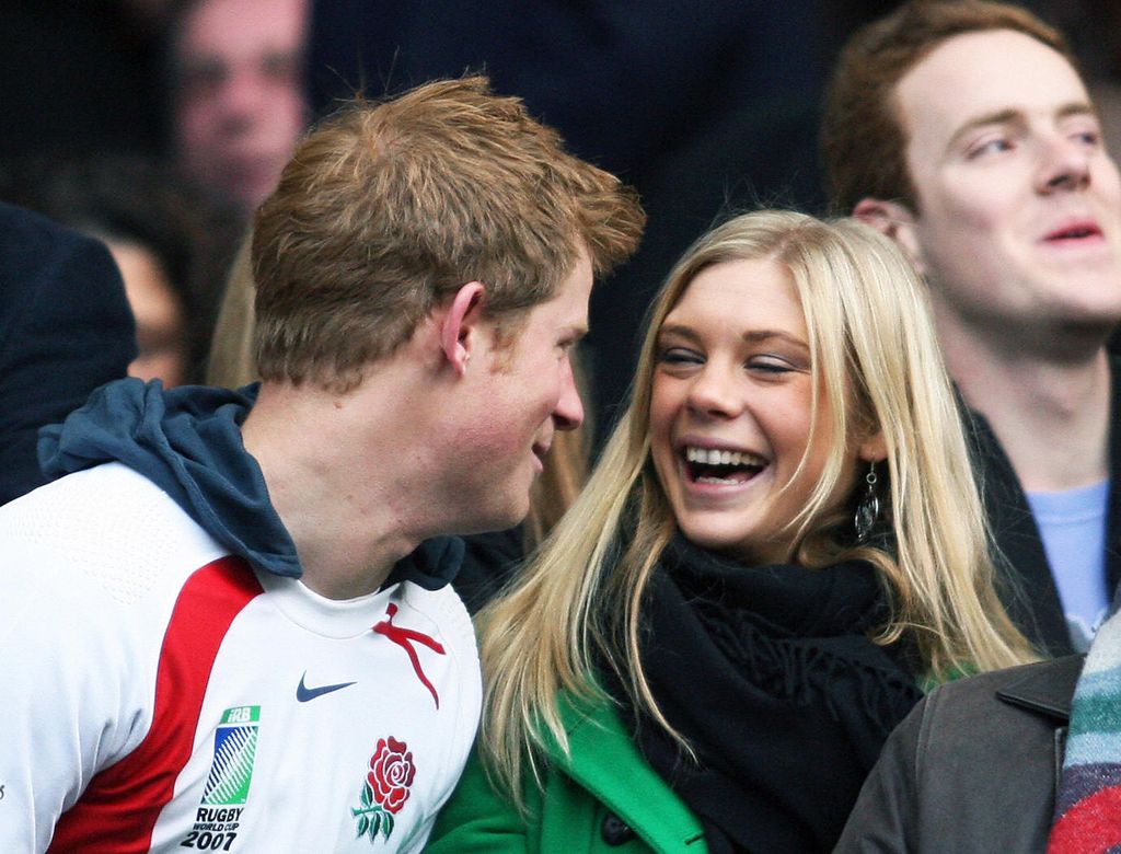 Harry and Chelsy watching a rugby match