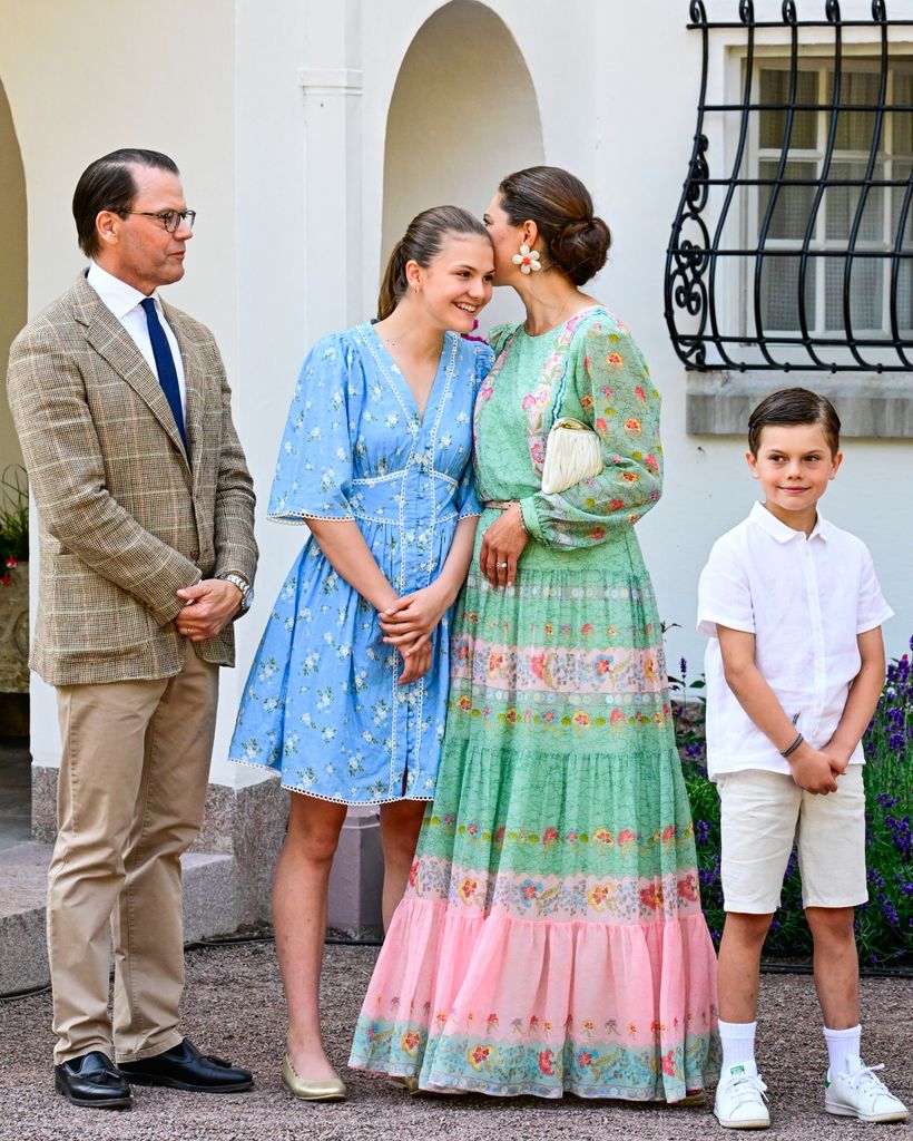 crown princess victoria kissing daughter on head