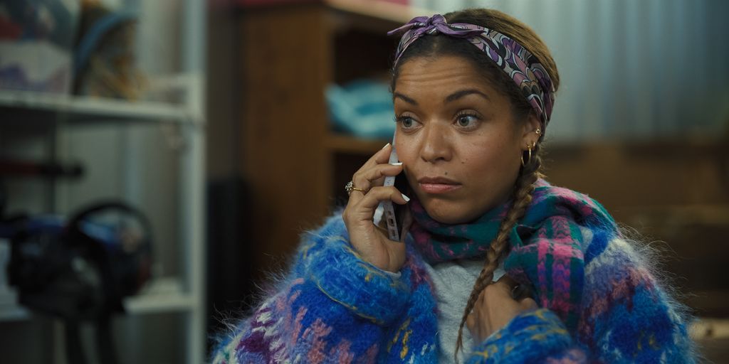 Antonia Thomas takes phone call in Apple TV+ show Still Up