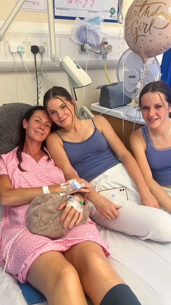 Abby with her twin daughters in hospital 
