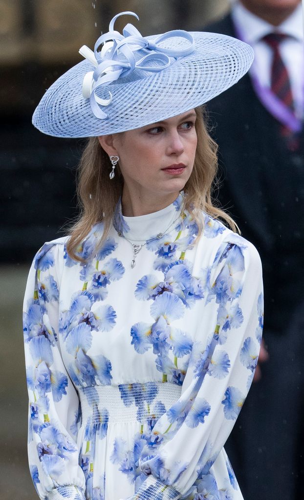 Lady Louise Windsor in blue hat and floral dress at  Westminster Abbey coronation of King Charles
