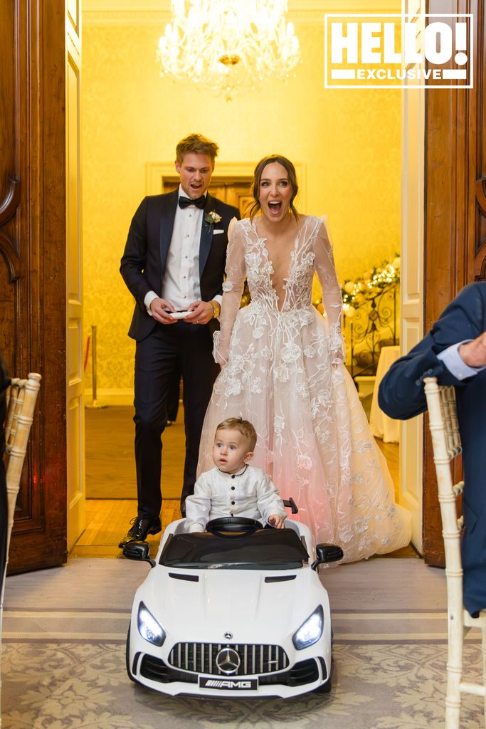 Maeva D'Ascanio and James Taylor leaving wedding ceremony with son Beau in toy car 