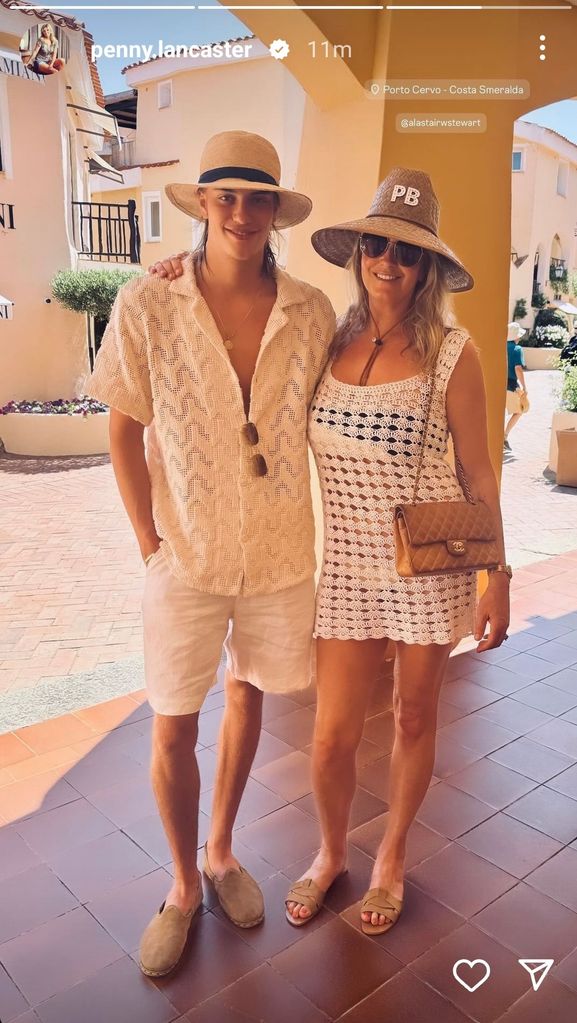 mother and son on holiday posing in porch