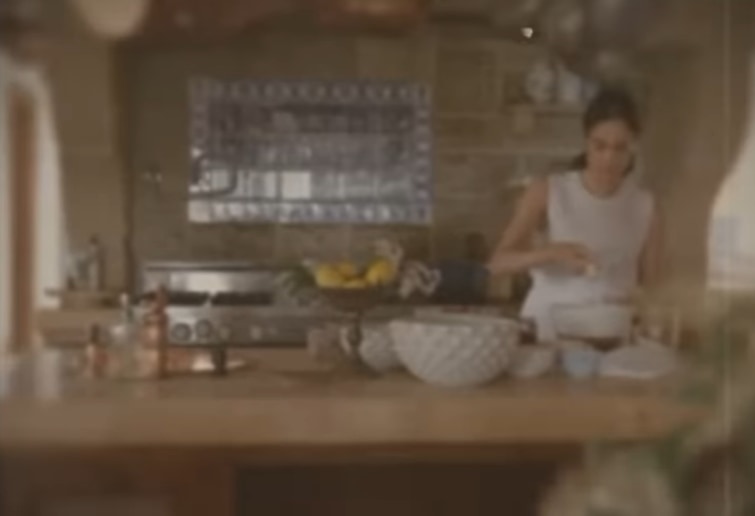 Meghan was seen baking in her kitchen during the promotional video