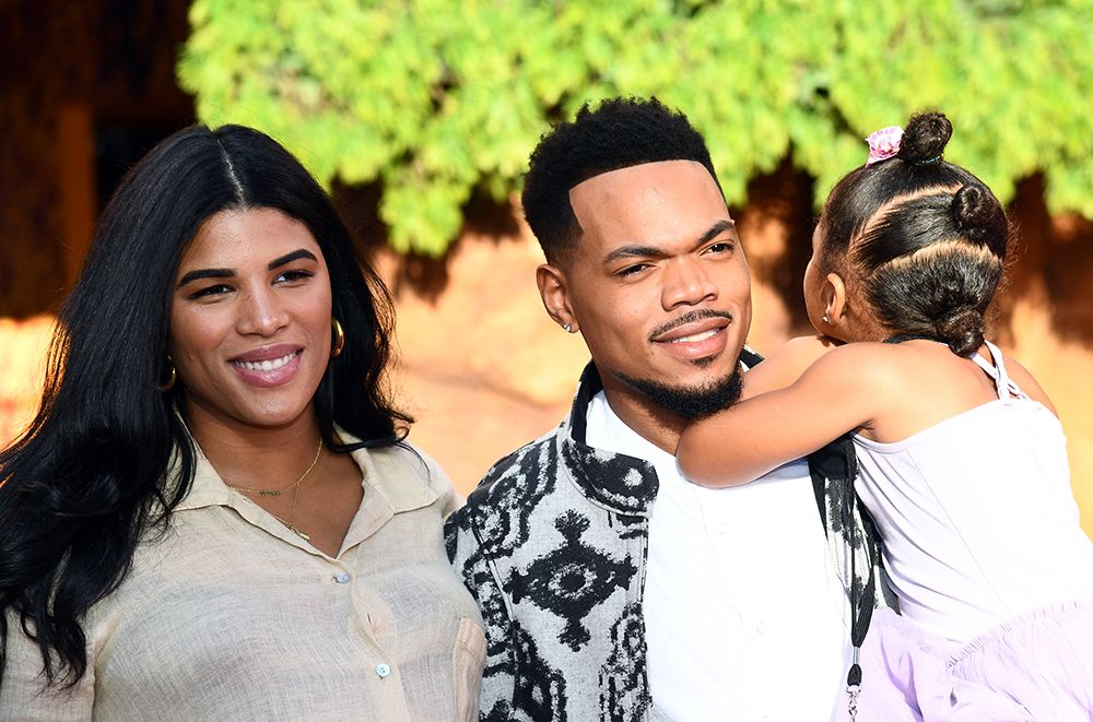 Chance the Rapper and Kirsten Corley with their daughter Kensli