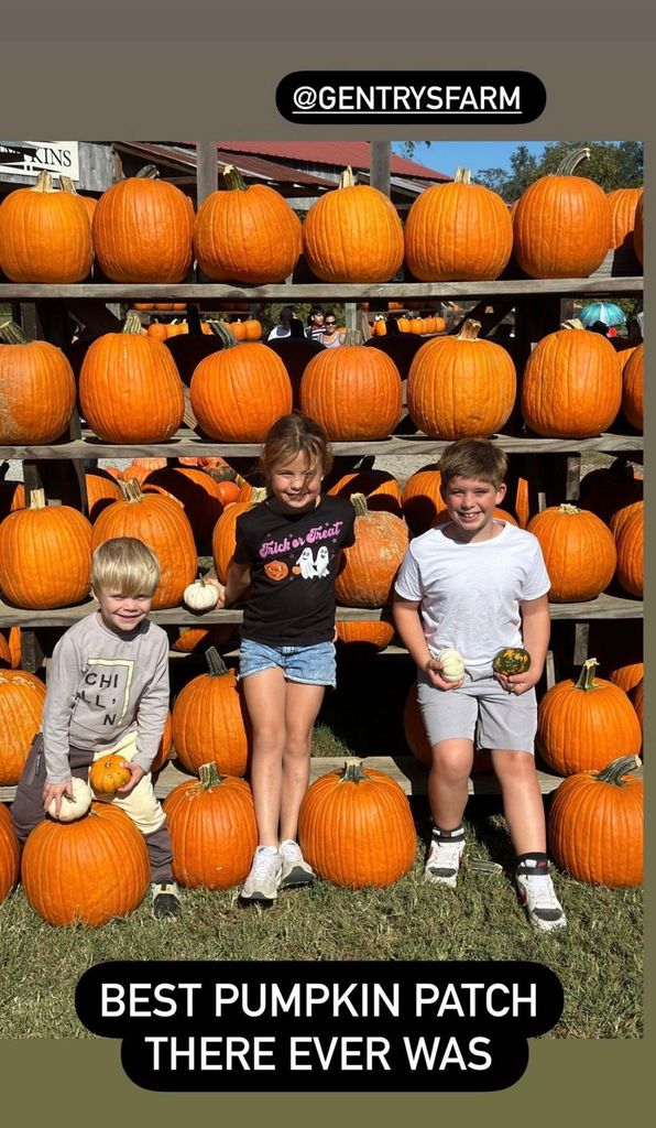 Photo posted by Christina Hall to her Instagram Stories October 2023 where her sons Brayden and Hudson are posing next to a friend while at a pumpkin patch in Tennessee.