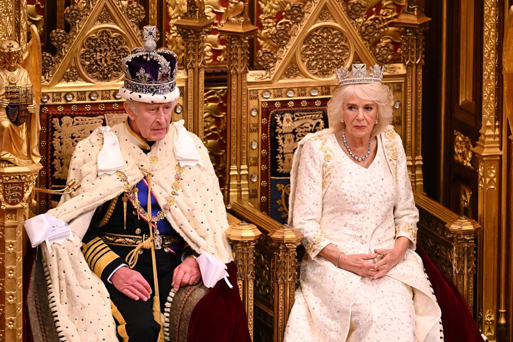 King Charles III and Queen Camilla arrive for the start of the State Opening of Parliament in the House of Lords Chamber