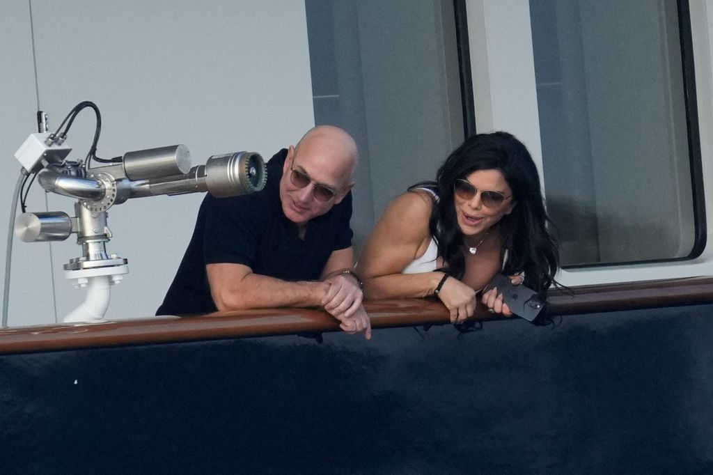 Jeff Bezos and Lauren Sanchez admire the views from the yacht
