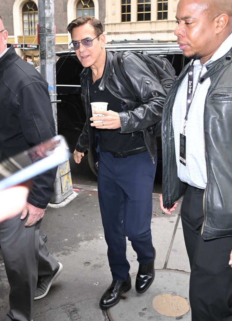 George Clooney sported a darker head of hair while greeting fans in New York
