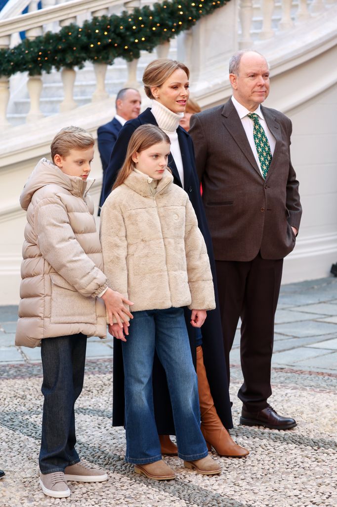 monaco royals stood in line in coats