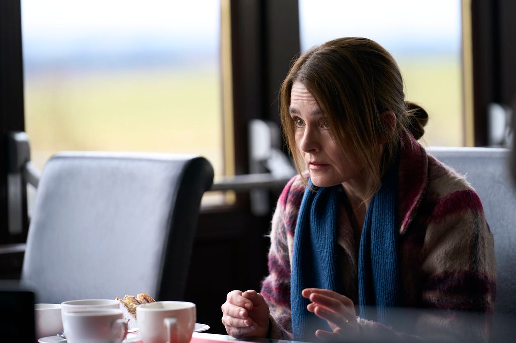 woman sitting in cafe