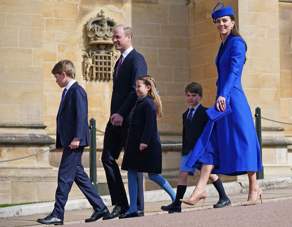 The Waleses coordinated in blue and navy outfits