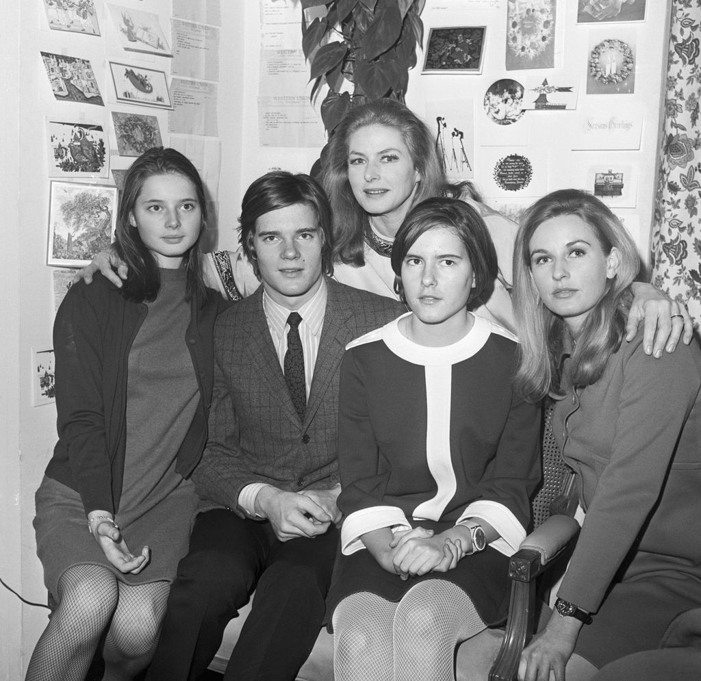 NEW YORK-12/28/67-: It's family reunion time as actress Ingrid Bergman gets together with her children in her dressing room of the Broadhurst Theatre here December 27th. From left are: Miss Bergman's children by her second husband, Italian film figure Roberto Rossellini, Isabella, 15, Robertino, 18, and Isotta, Isabella's twin; at right, Pia Lindstrom, 25, Miss Bergman's daughter by her first husband, Dr. Peter Lindstrom. The children came to New York from their respective homes to spend the holidays with their mother, who is appearing in the stage production of Eugene O'Neill's "More Stately Mansions."