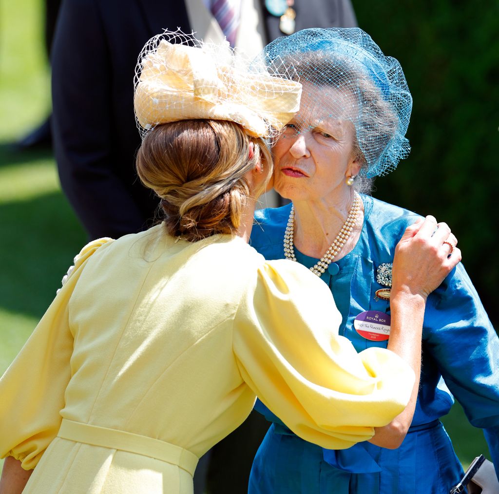 Harriet Sperling kisses Princess Anne, Princess Royal  at Royal Ascot
