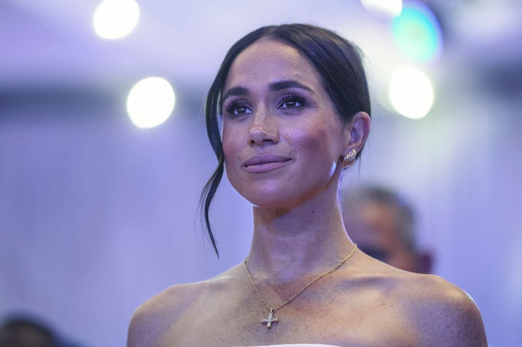 Britain's Meghan, Duchess of Sussex, looks on as she attends a Sit Out with Britain's Prince Harry (unseen), Duke of Sussex, at the Nigerian Defence Headquarters in Abuja on May 11, 2024 as they visit Nigeria as part of celebrations of Invictus Games anniversary. (Photo by Kola SULAIMON / AFP) (Photo by KOLA SULAIMON/AFP via Getty Images)