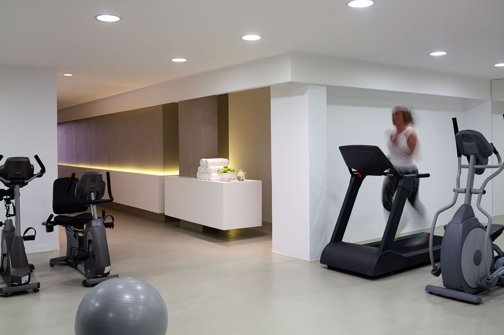 gym equipment at the ixian grand & all suites