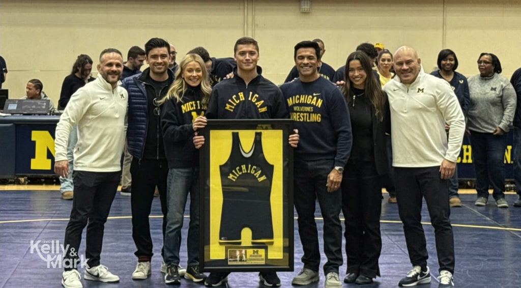 Kelly Ripa and Mark Consuelos joined by their kids Michael and Lola for Joaquin Consuelos' senior night with his wrestling coaches, shared on "LIVE with Kelly and Mark"