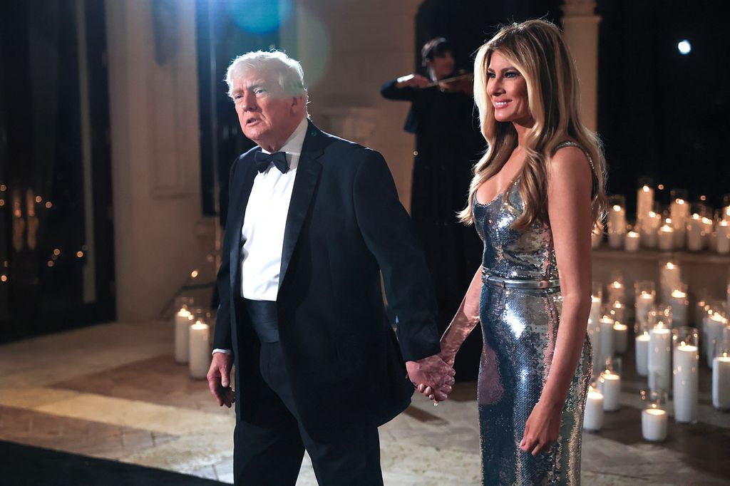 Melania Trump in a silver sequinned dress with Donald in tuxedo