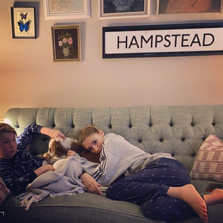 jamie's kids in living space adorned with artwork