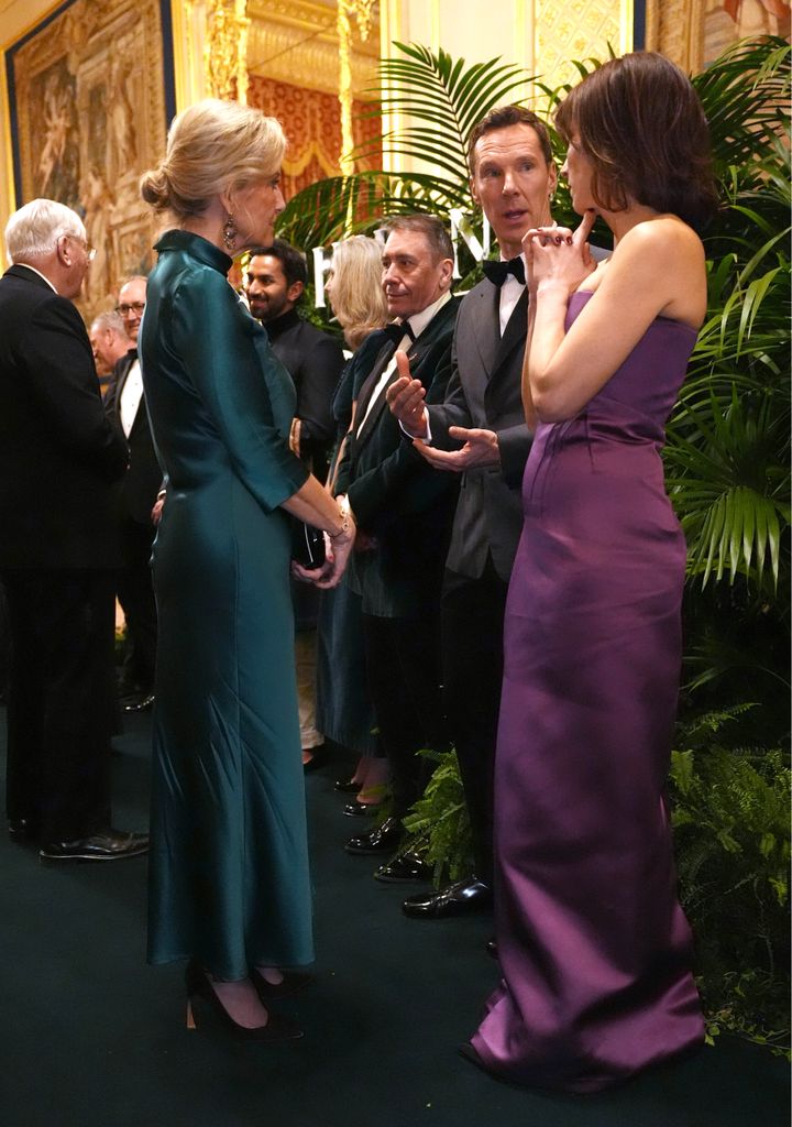 WINDSOR, ENGLAND - JANUARY 28: Sophie, Duchess of Edinburgh speaks to Jools Holland, Benedict Cumberbatch and Sophie Hunter in the Grand Reception Room after they attended the premiere of Prime Video's Finding Harmony: A King's Vision, at Windsor Castle on January 28, 2026 in Windsor, England. The documentary outlines Charles' philosophy of harmony, which encourages people to see themselves as part of nature, not apart from nature, and will be available on Prime Video from Friday February 6. (Photo by Jonathan Brady - Pool/Getty Images)