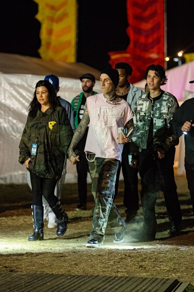 Kourtney Kardashian and Travis Barker attend day one of Reading Festival 2024 at Richfield Avenue on August 23, 2024 in Reading, England.