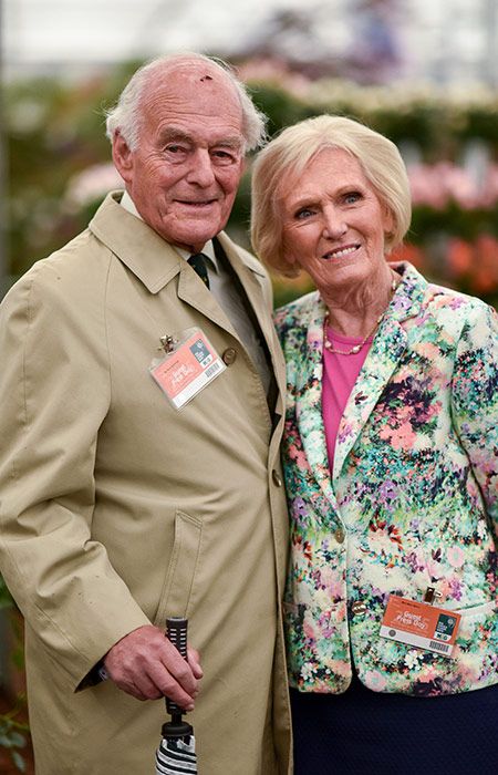 Mary Berry and her husband Paul smiling in a full-length photo