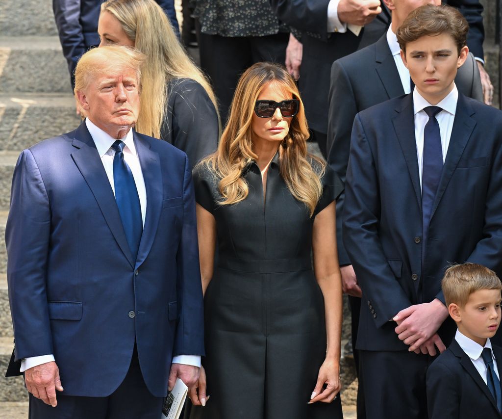 President Donald Trump, former U.S. First Lady Melania Trump and Barron Trump are seen at the funeral of Ivana Trump on July 20, 2022 in New York City