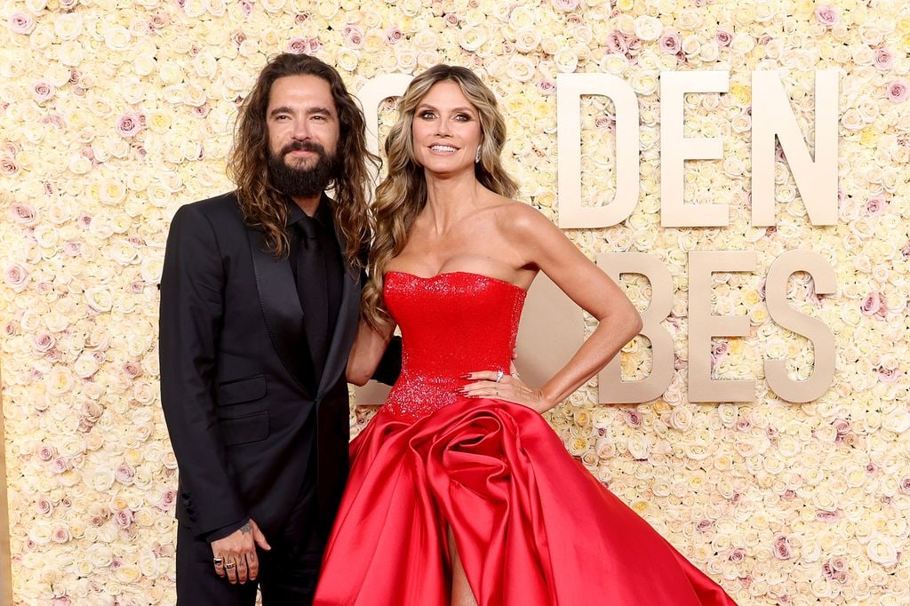 Heidi Klum in red strapless dress at Golden Globe Awards with Tom Kaulitz